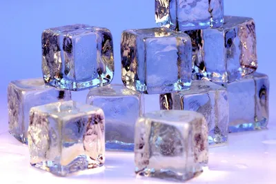 Ice cube isolated on white. Кубик льда, изолированный на белом фоне Stock  Photo - Alamy